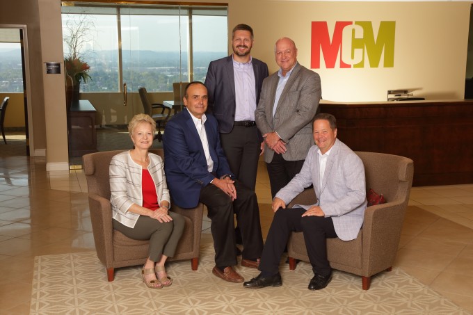 Diane Medley, Brad Smith, Nate Deskins, Steve Kerrick and Jim Kramer of MCM CPAs  Advisors and MCM Kramer Technology Solutions