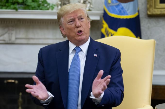 President Trump delivers remarks to members of the news media, during a meeting in the Oval Office.