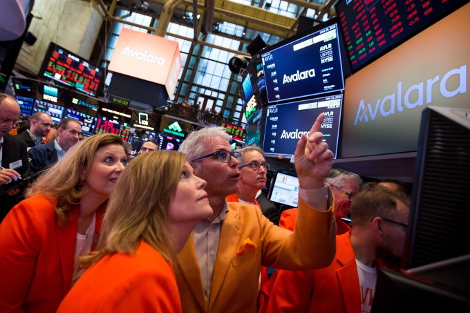 Avalara CEO Scott McFarlane and others watch the stock price from the NYSE floor. 