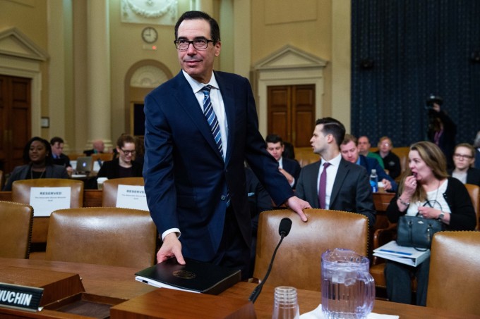 U.S. Treasury Secretary Steven Mnuchin arrives to testify during a House Ways and Means Committee hearing in Washington, D.C.
