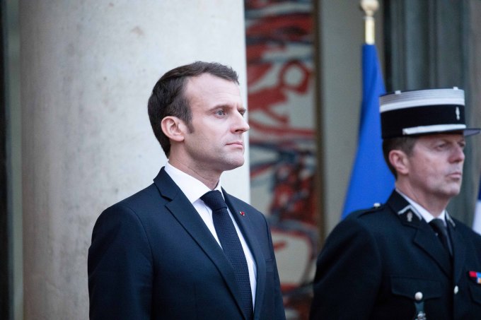 French President Emmanuel Macron (left)