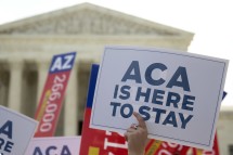 Demonstrators outside the Supreme Court in advance of the court's rulling that the ACA was constitutional