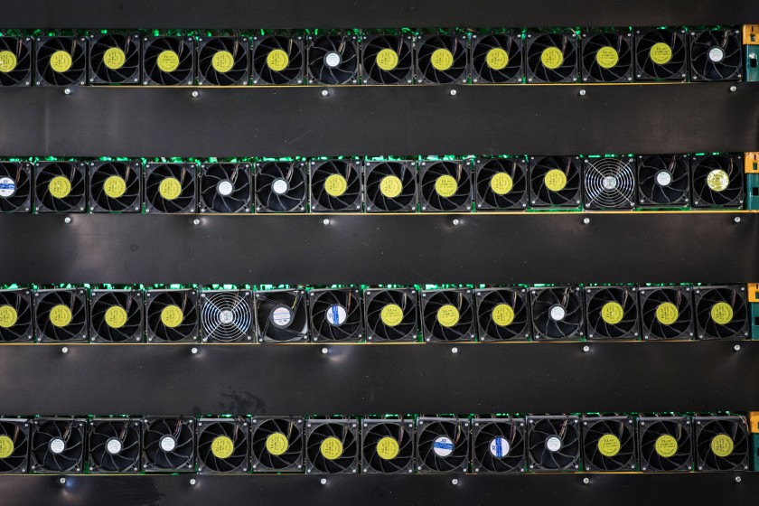 Cryptocurrency mining rigs sit on racks at a Bitfarms facility in Saint-Hyacinthe, Quebec, Canada.